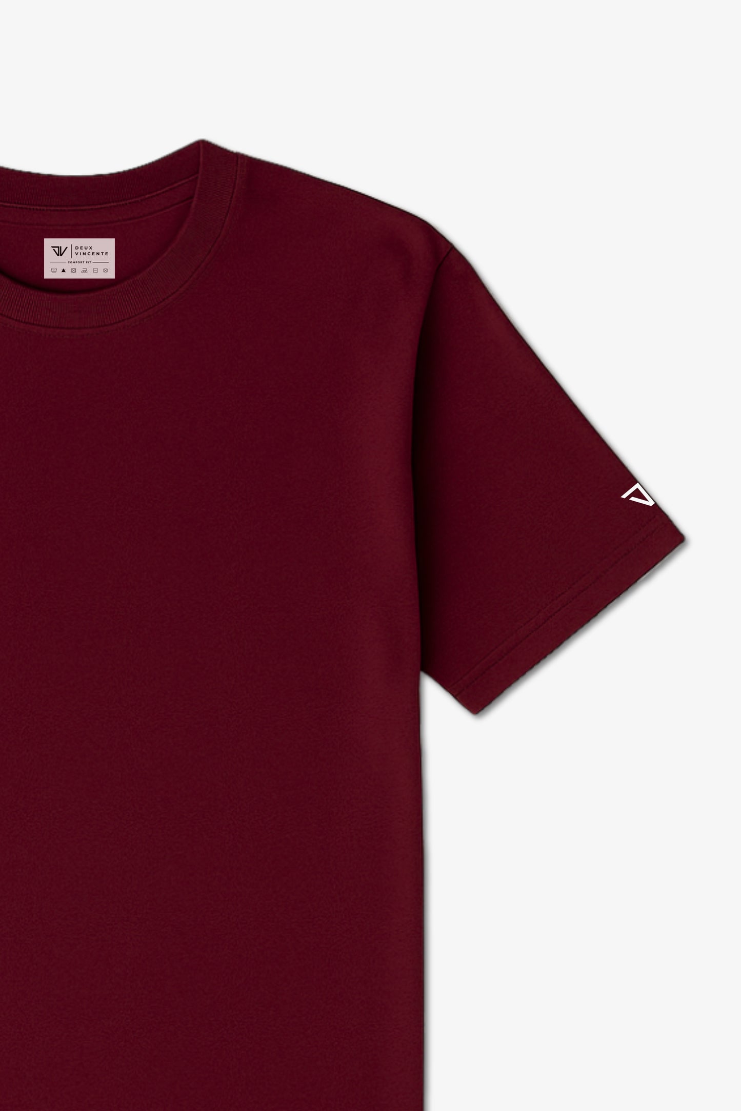Close Up Flat Lay of a Maroon Deux Vincente T-shirt with logo on sleeve