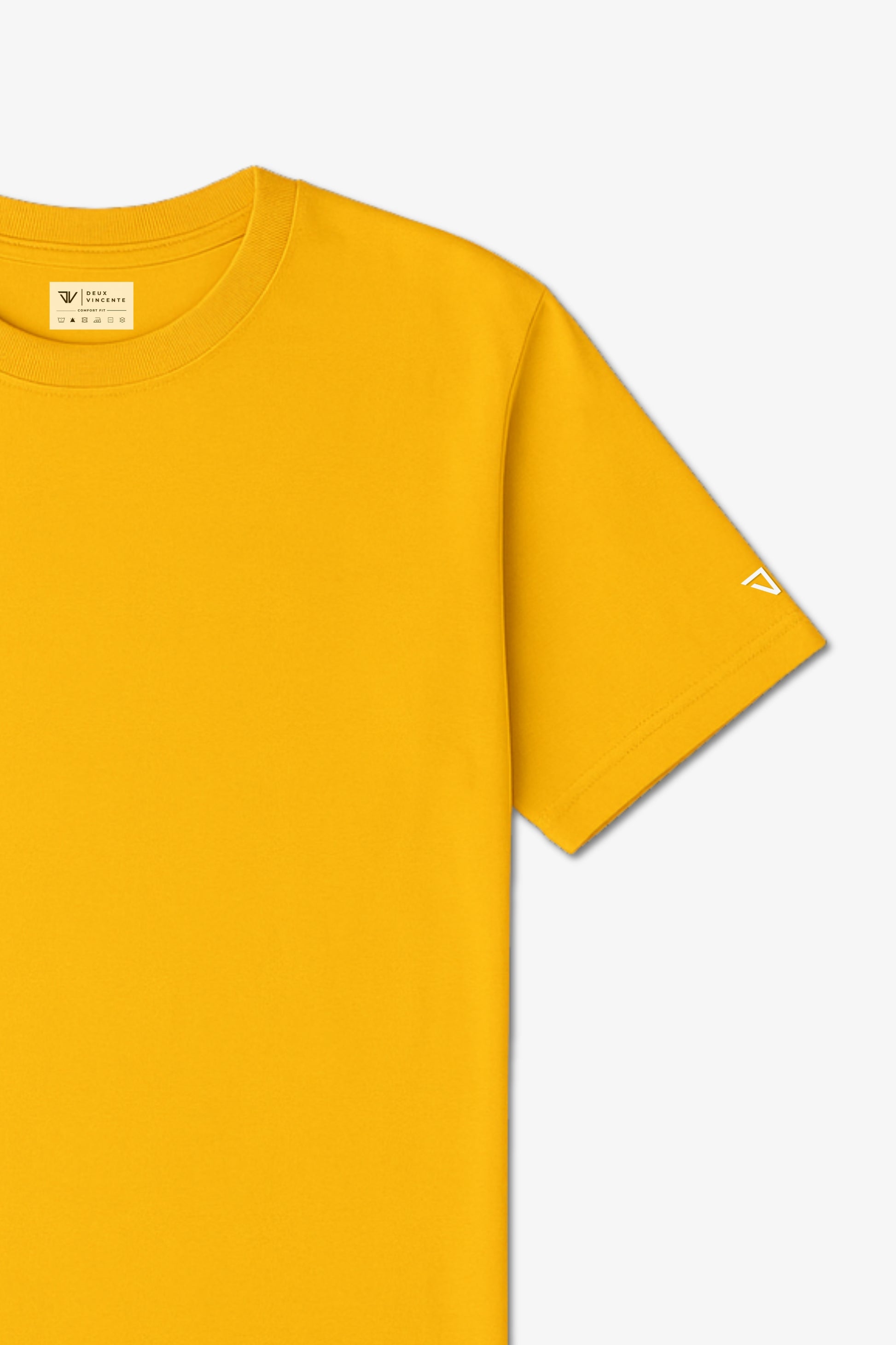 Close Up Flat Lay of a Yellow Deux Vincente T-shirt with logo on sleeve